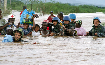 Pris entre la politique et l'argent: Adaptation au changement climatique en Afrique, aux Caraïbes et au Pacifique